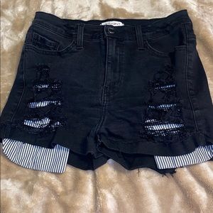 Black ripped denim shorts